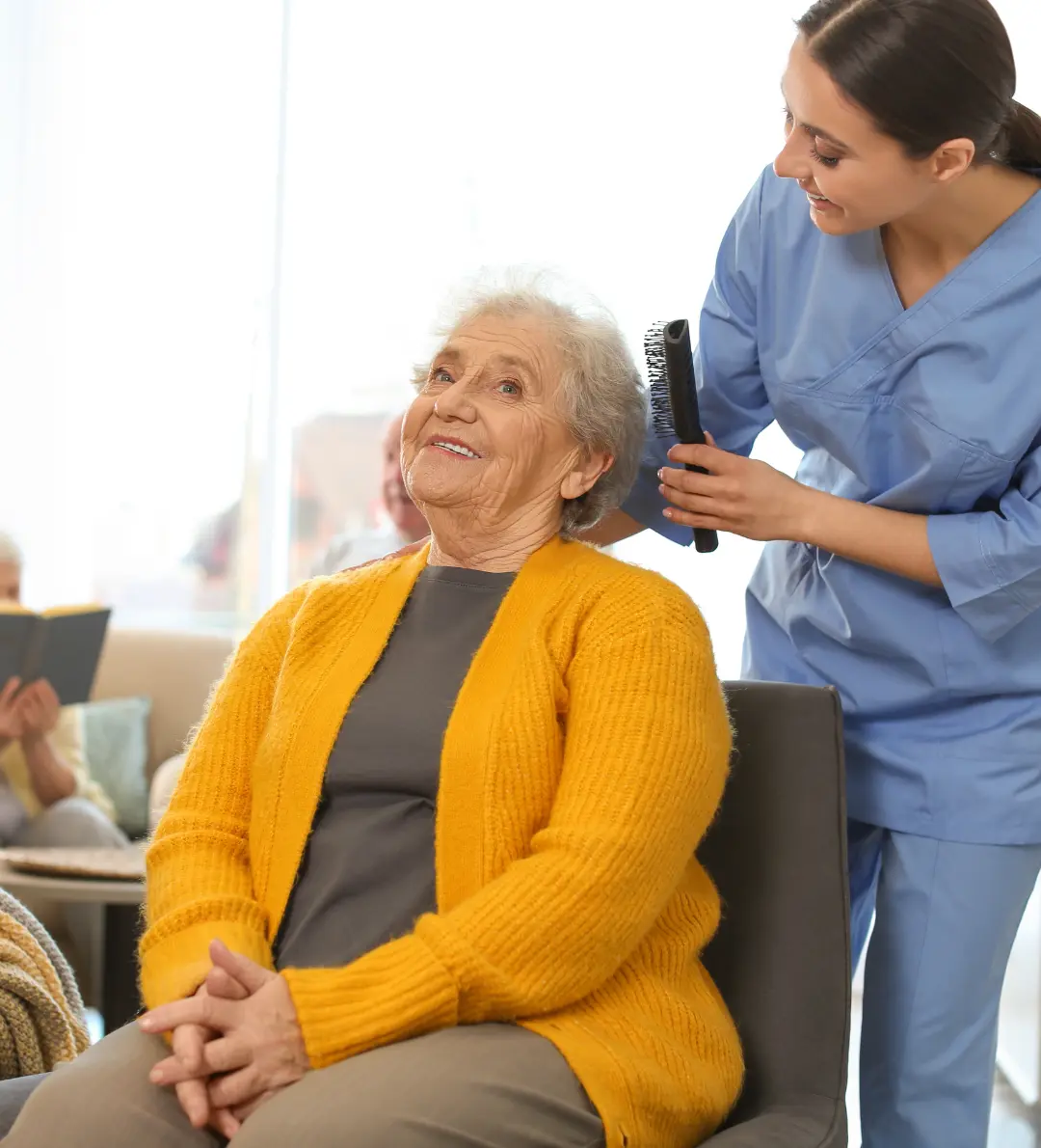 Caregiver providing elderly care service at home in Bangladesh