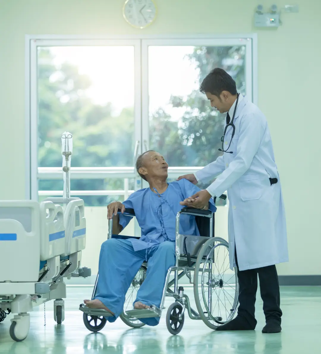 Patient care service in Dhaka - nurse assisting elderly patient